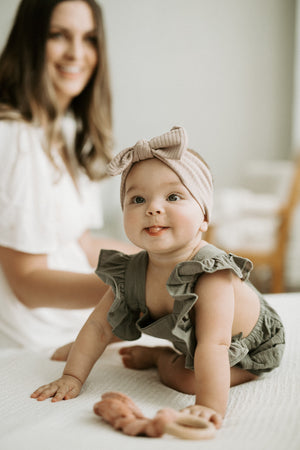 
                  
                    Ribbed Baby Bow Headband
                  
                