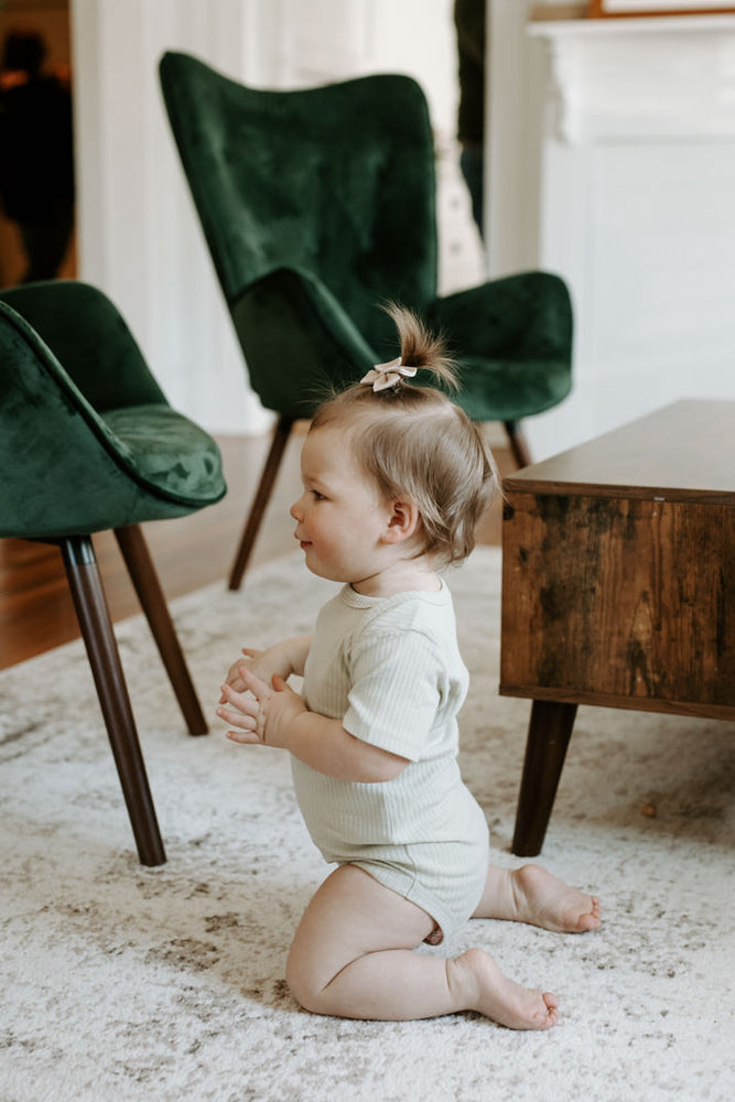 
                  
                    Short Sleeve Ribbed Bodysuit
                  
                