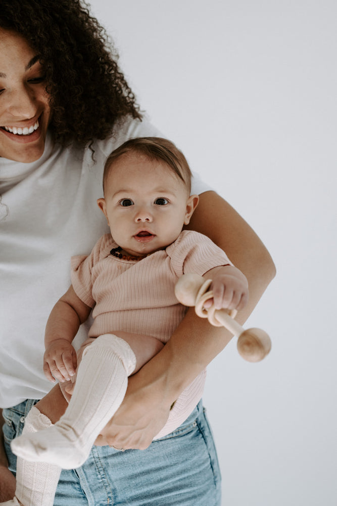 
                  
                    Short Sleeve Ribbed Bodysuit
                  
                