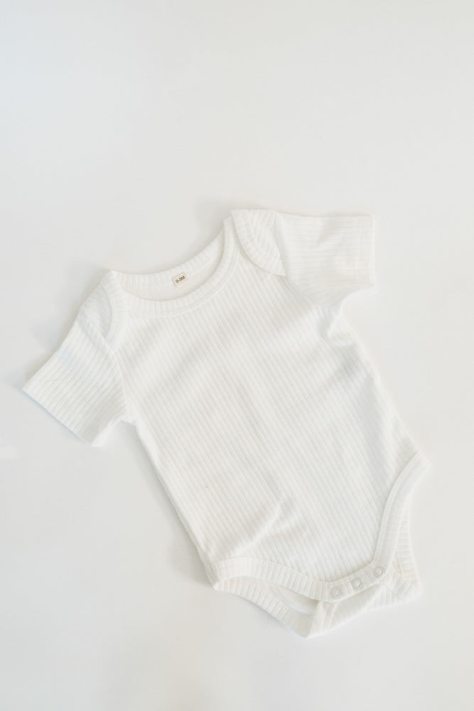 
                  
                    Short Sleeve Ribbed Bodysuit
                  
                