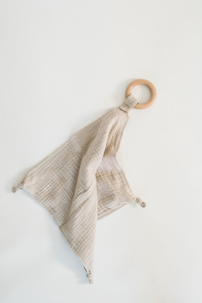 
                  
                    Lovie Blanket With Wooden Ring
                  
                