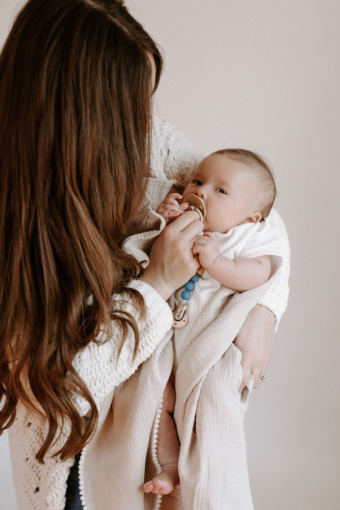 
                  
                    Muslin Swaddle Blanket
                  
                